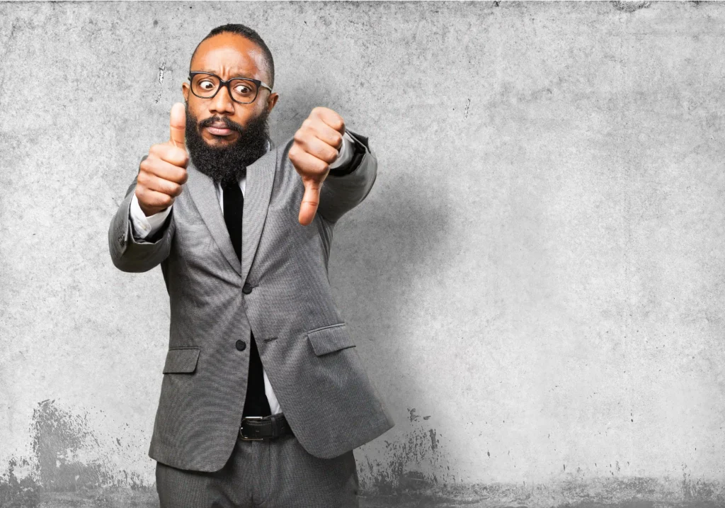 10 HR Challenges That’ll Define How We Work in 2026 man with thumb up thumb down