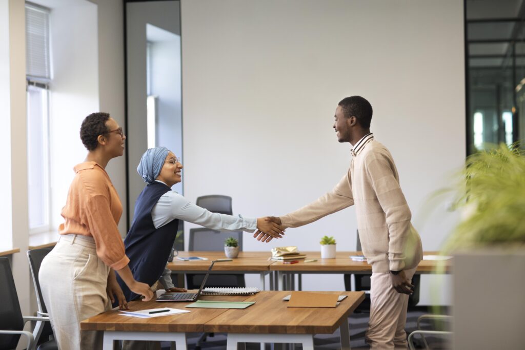 Top 5 Contract Staffing Companies in Nigeria (2026) man introducing himself employers office job interview 2