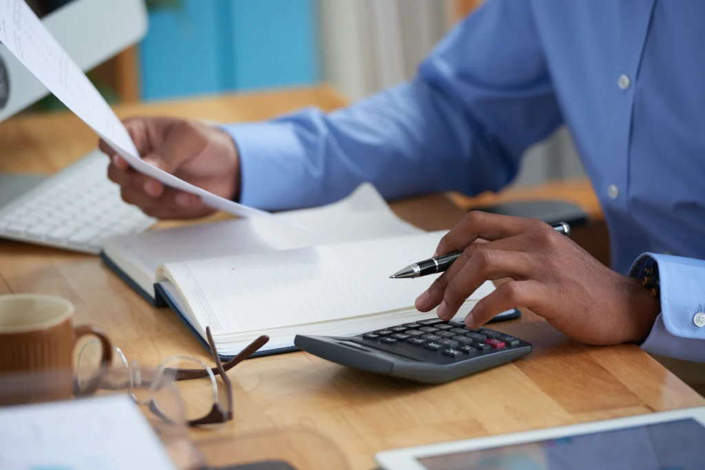 side view cropped man working financial report