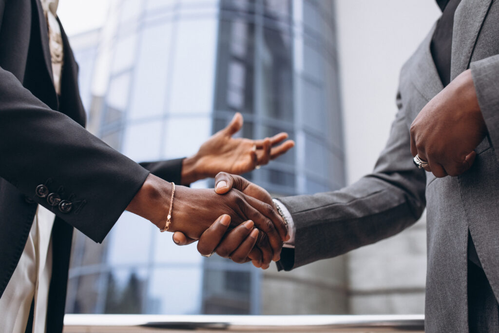HR Outsourcing in Nigeria: Services and Benefits african business male people shaking hands